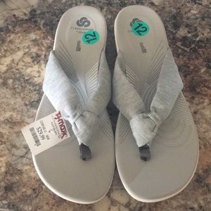 NWT Gray flip flops by Cloudsteppers by Clarks